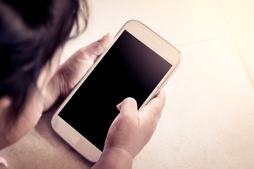 kid's hands hold smart phone,tablet,cellphone for playing