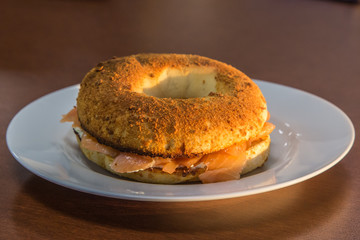 Toasted bagel with salmon and cheese