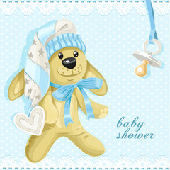 Baby shower card with blue soft rabbit and baby's dummy