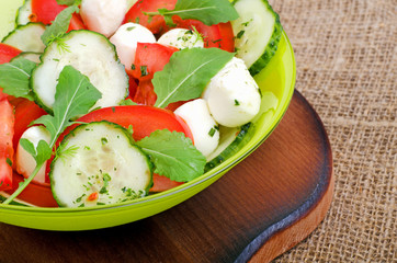 salad with mozzarella cheese, tomatoes, cucumber and rocket sala