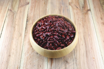 Red beans in the wooden bowl.