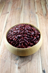 Red beans in the wooden bowl.