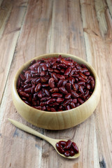 Red beans in the wooden bowl.