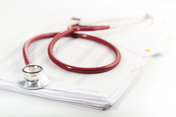 Stethoscope and medical record.