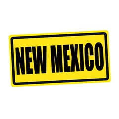 New Mexico black stamp text on yellow