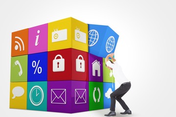 Composite image of businessman bending and pushing