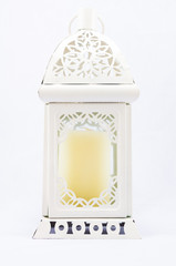 White vintage candle lamp on white background
