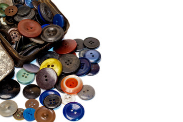 Retro collection of vintage buttons in the old iron box