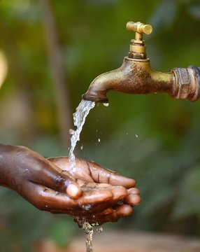 Social Issues: Water Scarsity Problem: Drinking Symbol for African Children