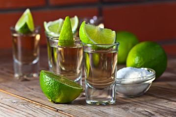 gold tequila with salt and lime