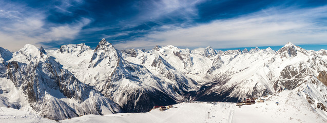 Snowy peaks against the blue sky