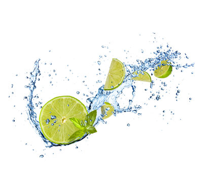 Fresh lime in water splash on white background