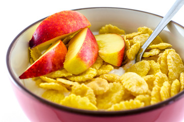 Breakfast with cornflakes on the white background