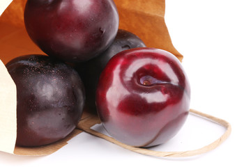 plum isolated on white background paper shopping bags