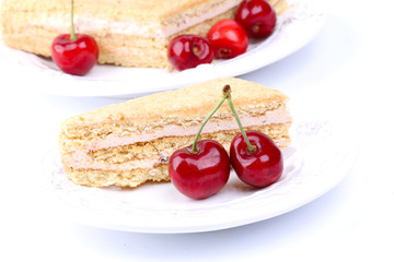 cheesecake with a cherry on a white background sweet dessert