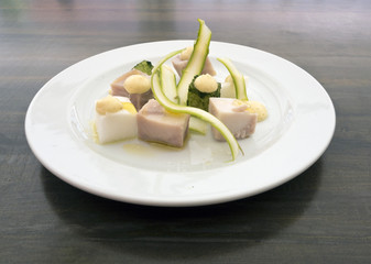 Homemade ham from farm rabbit, kohlrabi, radishes