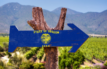 Oregon Flag wooden sign with winery background