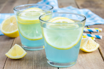 Blue lemonade with fresh lemons - obrazy, fototapety, plakaty