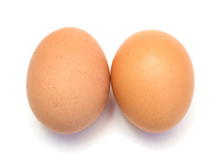 Two eggs on a white background