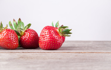 strawberries on a wooden table