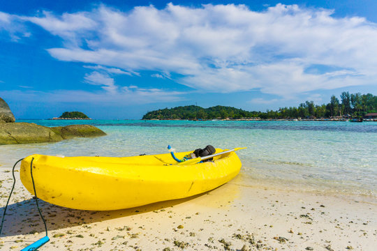 Yellow kayak on the sea. Kayaking on island