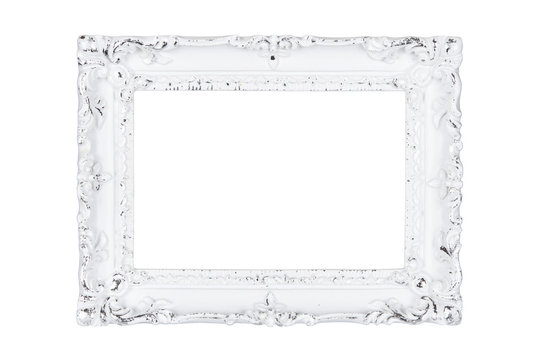 White carved picture frame isolated over white with clipping path.