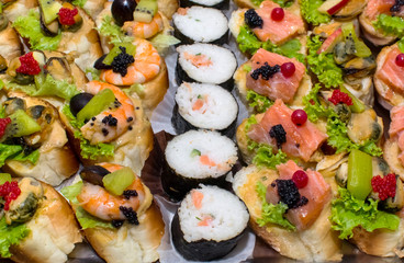 sushi Salmon and caviar rolls served on a plate