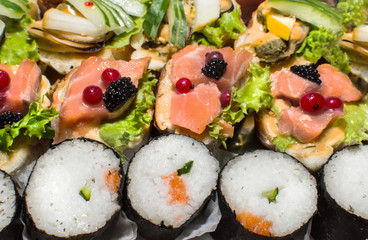 sushi Salmon and caviar rolls served on a plate