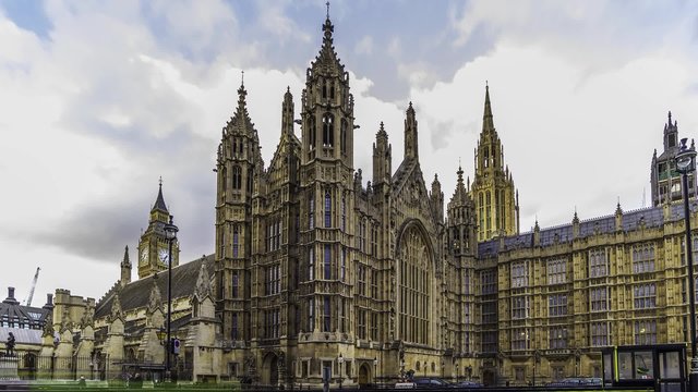 Timelapse view of the north facade of House of Parliament in London, also known as Wesminster Palace, showing the entrance of the British parliament