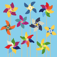Pinwheels collection on sky blue background
