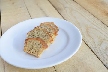 Banana cake on white plate