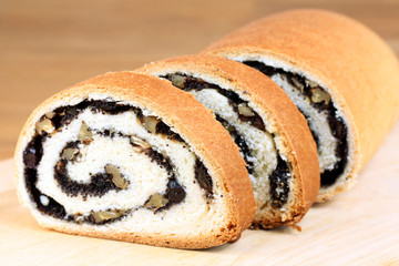 three pieces of home-made bun with poppy-seed and walnut
