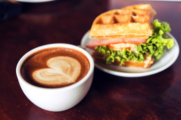 coffee mocha hot on wooden table on brown background