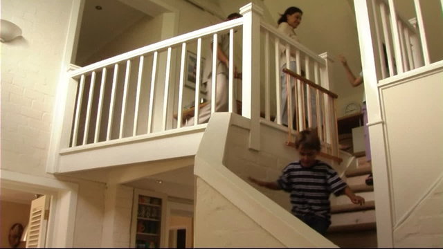 Family, running down stairs