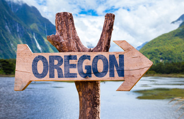 Oregon wooden sign with mountains background