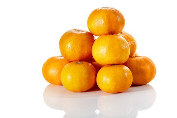 Stack of tropical tangerines, isolated on white with clipping pa