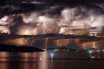 Dramatic stormy sky and lightning over Nha Trang Bay, Vietnam