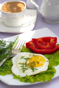 Fried eggs with vegetables and coffee for your breakfast