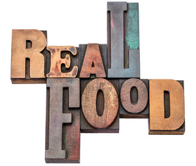 real food word abstract in wood type