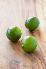 Limes on cutting board