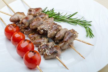 Grilled chicken hearts barbecue