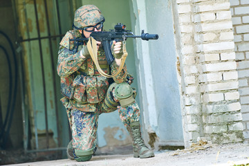 Military soldier with pistol