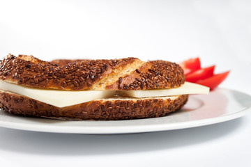 Simit (Turkish bagel) on white plate