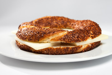 Simit (Turkish bagel) on white plate