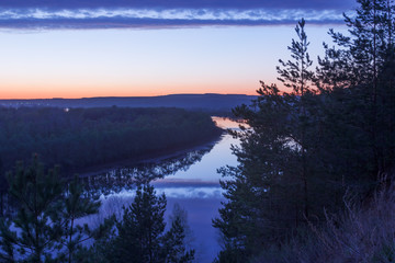 Twilight spring landscape with the river from the high bank © Igor Gorshkov