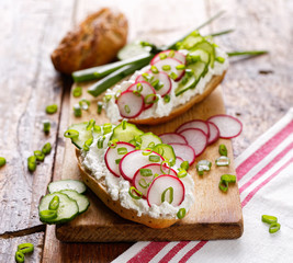 Sandwich with cottage cheese, radish, cucumber and scallion