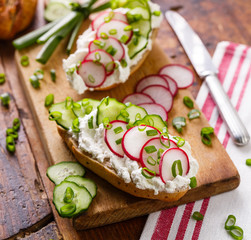 Sandwich with cottage cheese, radish, cucumber and scallion