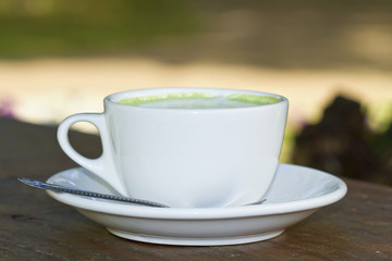 Hot green tea or cup 