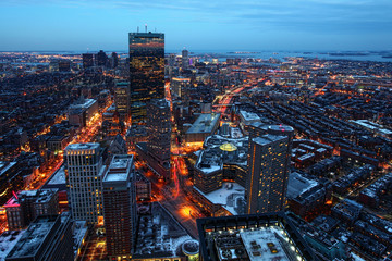 An aerial night view of Boston city center, Massachusetts - obrazy, fototapety, plakaty