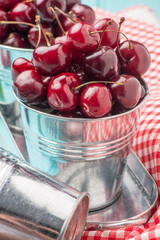 Cherries in blue wooden table